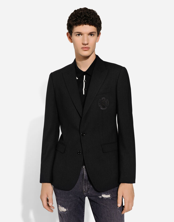 Dolce & Gabbana جاكيت صوف بقصة تاورمينا وصف أزرار مفرد ورقعة DG أسود G2NW0ZFU28E