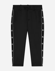 Dolce & Gabbana Stretch woolen pants with logo band Negro L42Q37LDC28