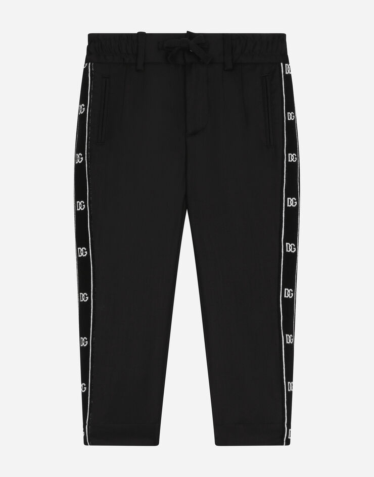 Dolce & Gabbana Pantaloni in tela di lana stretch banda logo Black L44P12FUBFA