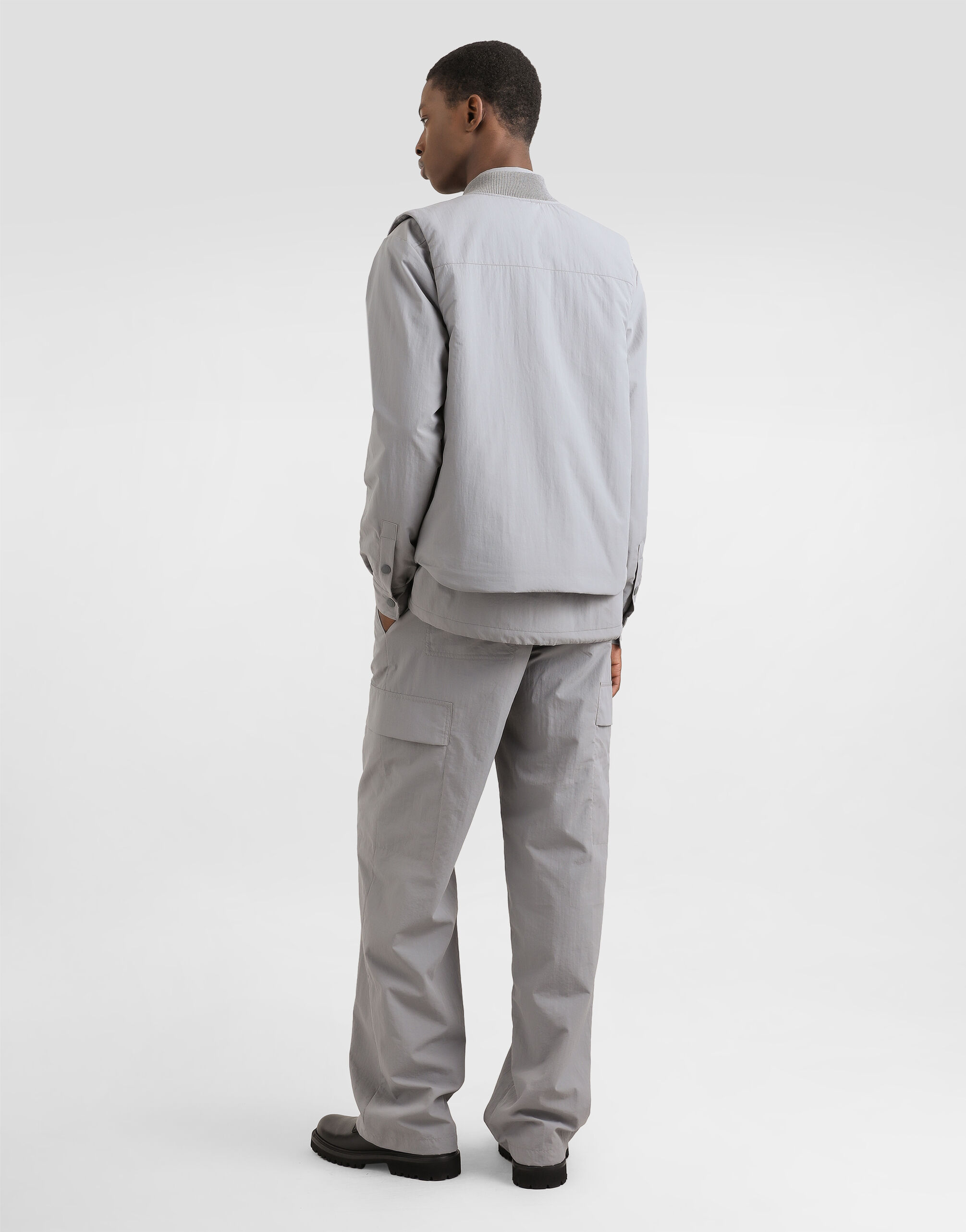 Padded technical fabric vest with tag in Grey for Men