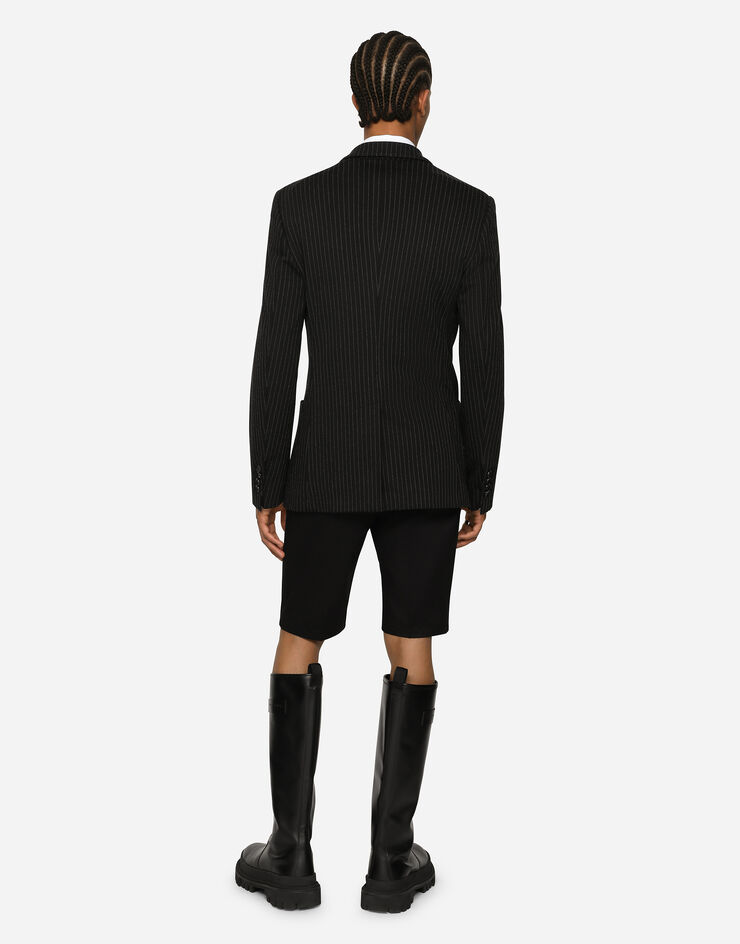 Dolce & Gabbana Bermudas de algodón elástico con parche DG Negro GWRREZGG869