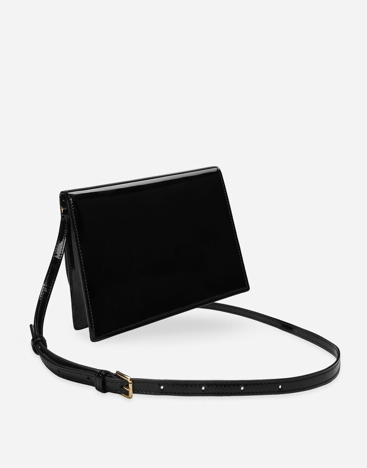 Dolce & Gabbana Sac DG Logo Bag à bandoulière en cuir verni Noir BB7287A1471