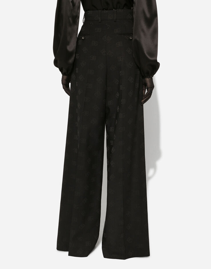 Dolce & Gabbana Flared wool jacquard pants with DG logo Black FTCP2TFJ2CI
