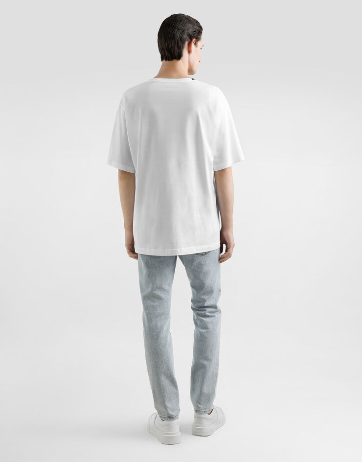 Dolce & Gabbana Jeans Slim aus Baumwollstretch mit Plakette Mehrfarbig GY07CDG8MV2