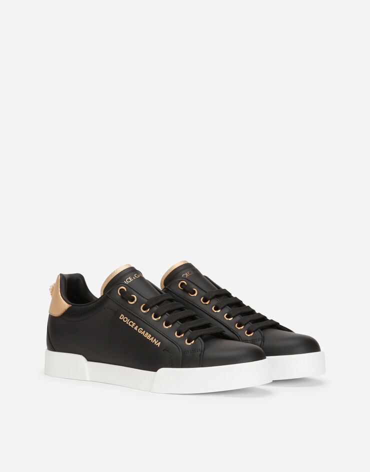 Dolce & Gabbana Sneakers Portofino en cuir de veau nappa à lettering Noir/Doré CK1602AN298