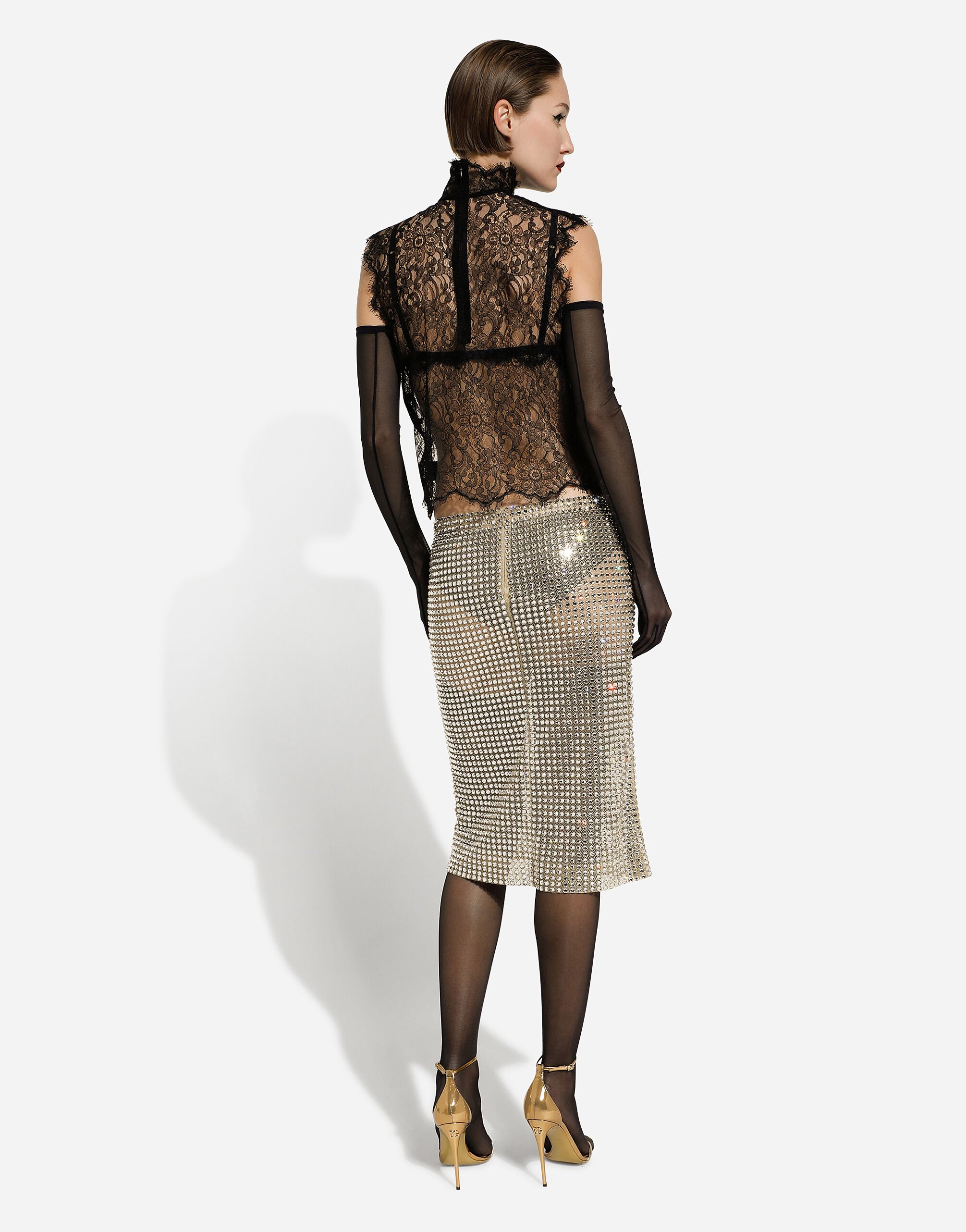 Tulle calf length skirt with all over fusible rhinestone embellishment in Crystal for Women Dolce Gabbana
