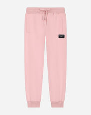 Dolce & Gabbana Jersey jogging pants with logo patch Pink EB0249AB018