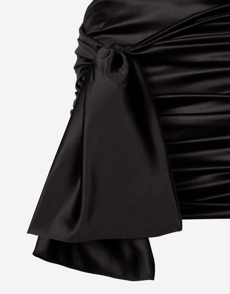 Dolce&Gabbana Short draped satin skirt with side bow Black F4CRCTFURAG