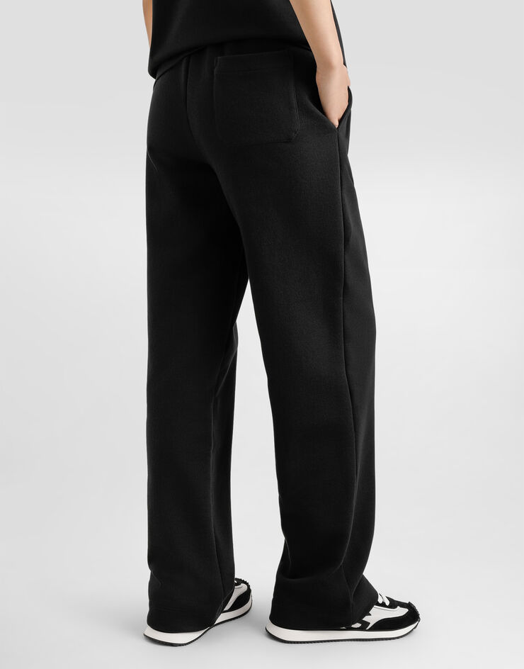 Dolce & Gabbana Pantaloni jogging in jersey con ricamo logo DG  in strass Nero FTC91ZGDCXW