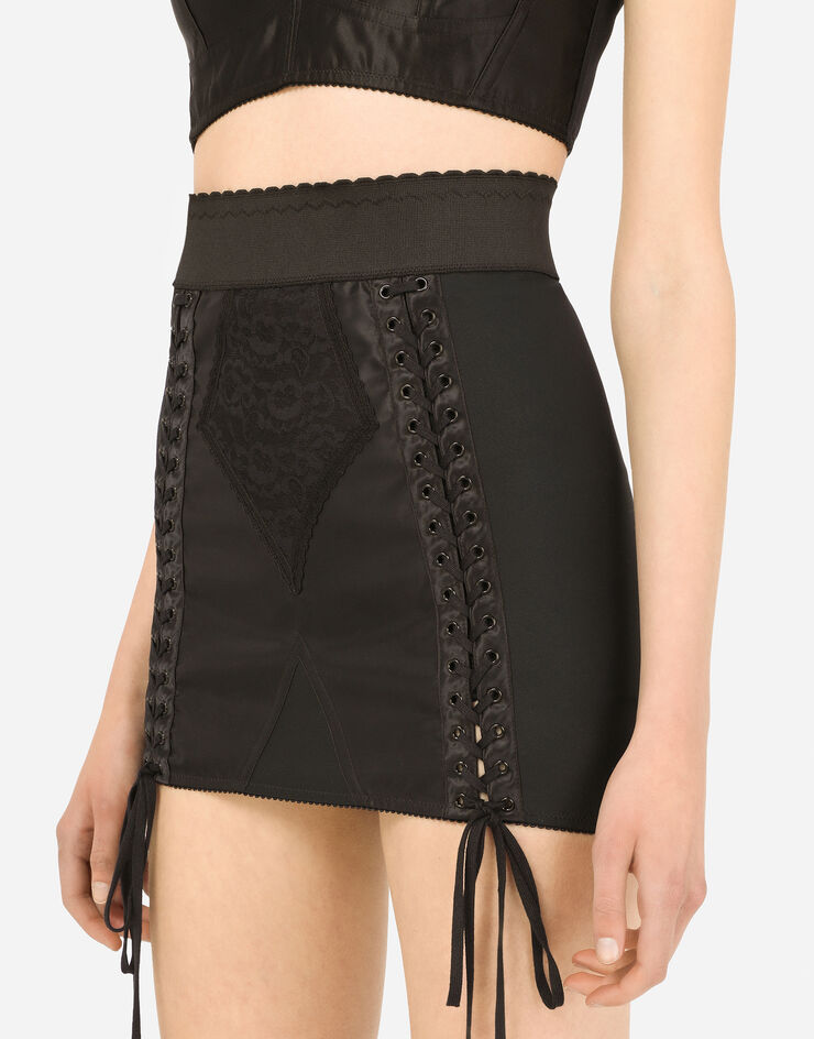 Dolce & Gabbana Corset-style miniskirt with laces and eyelets Black F4ANJTG9798