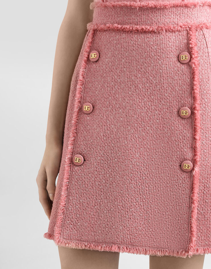 Dolce & Gabbana Kurzer Rock aus Raschel-Tweed mit dekorativen Knöpfen mit DG-Logo Rosa F4C03TGDCYK
