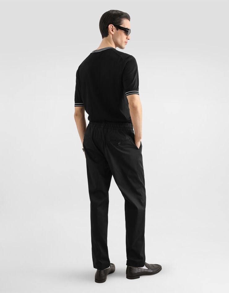 Dolce & Gabbana Pantalon de jogging en gabardine de coton Dolce & Gabbana Pantalon de jogging en gabardine de coton Black GP12QZFUFNV