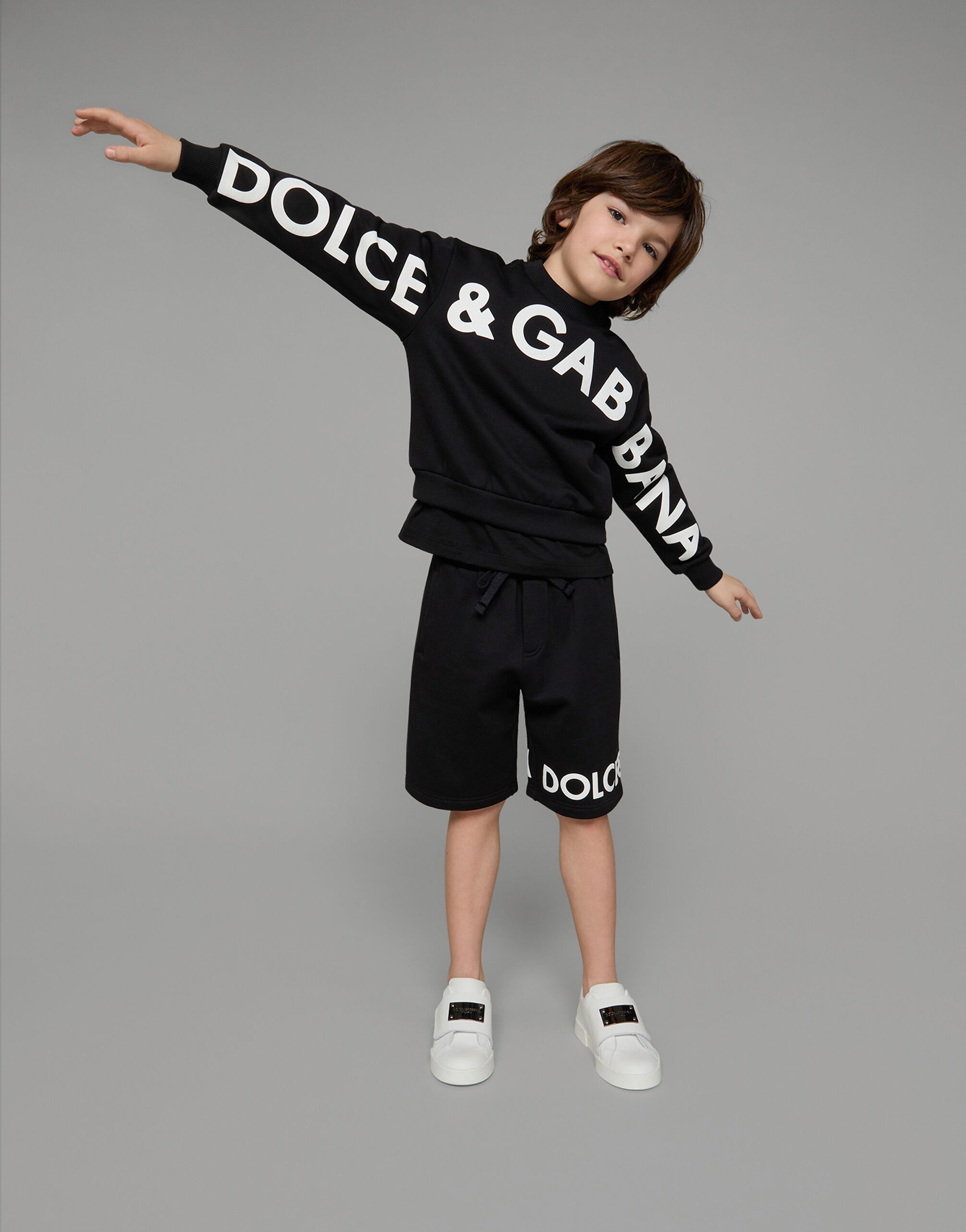Cotton jogging shorts with logo print in Black for Men