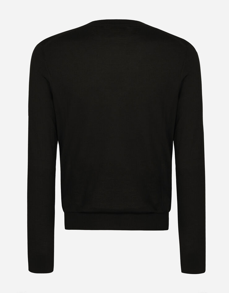 Dolce & Gabbana Jersey de cuello redondo de seda con logotipo Dolce&Gabbana Negro GXX02ZJBSJS