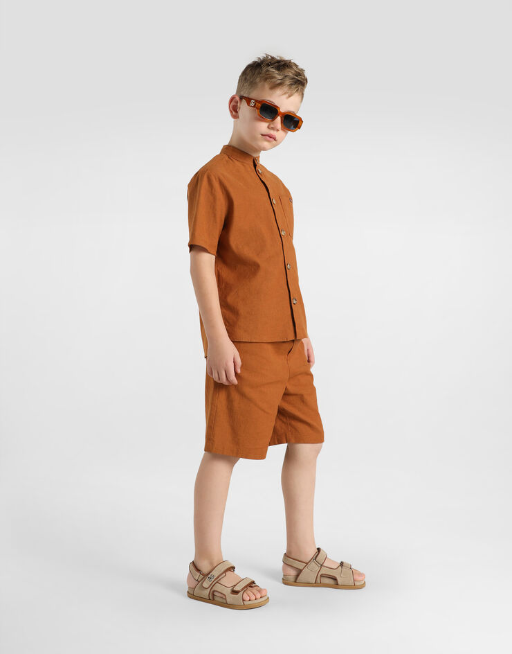 Dolce & Gabbana Cotton and linen canvas bermuda shorts Beige L43Q58LT372