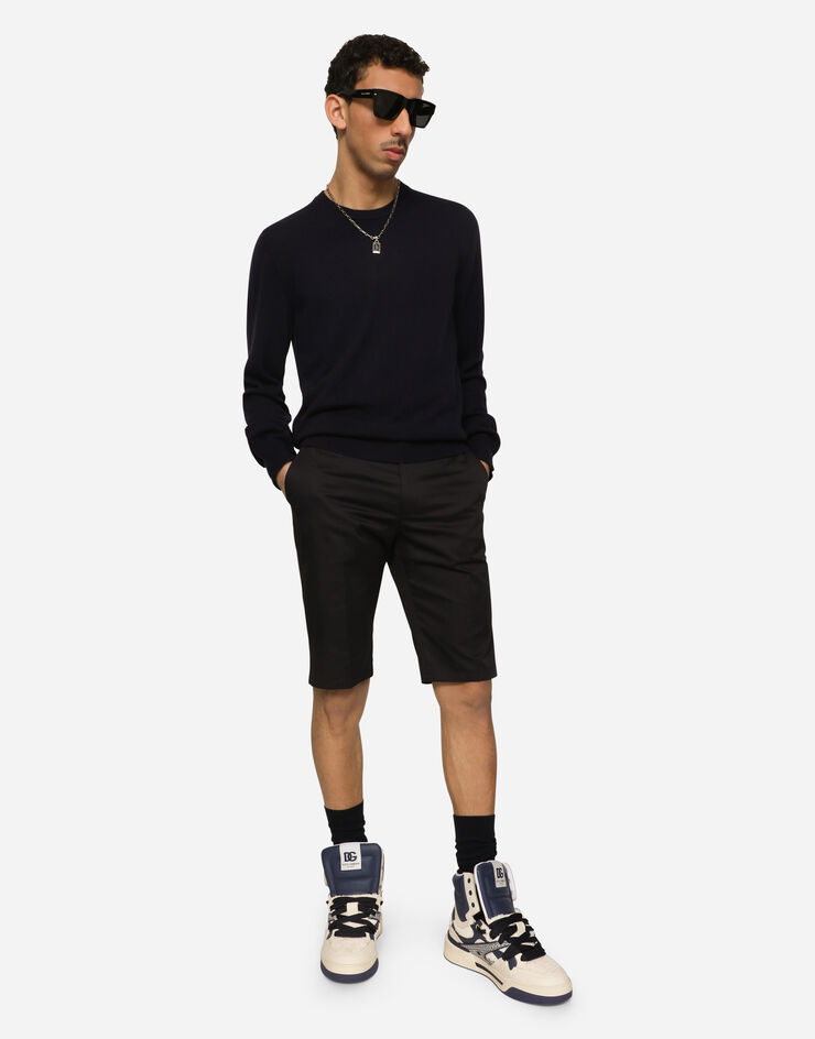 Dolce & Gabbana Bermudas aus Baumwollstretch mit DG-Patch Blau GWRREZGG869
