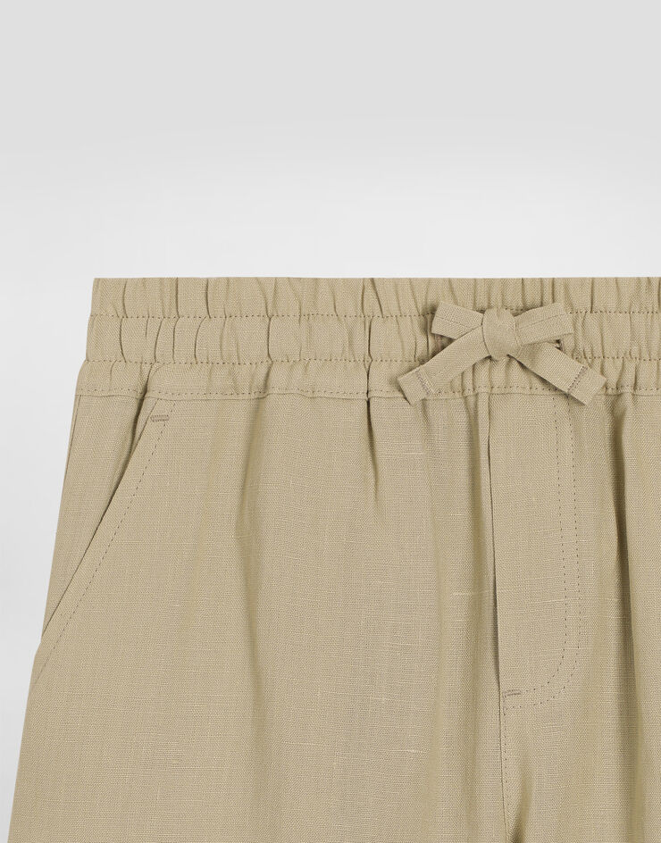 Dolce & Gabbana Pantaloni in lino con logo DG ricamato Beige L44P86G7O9A