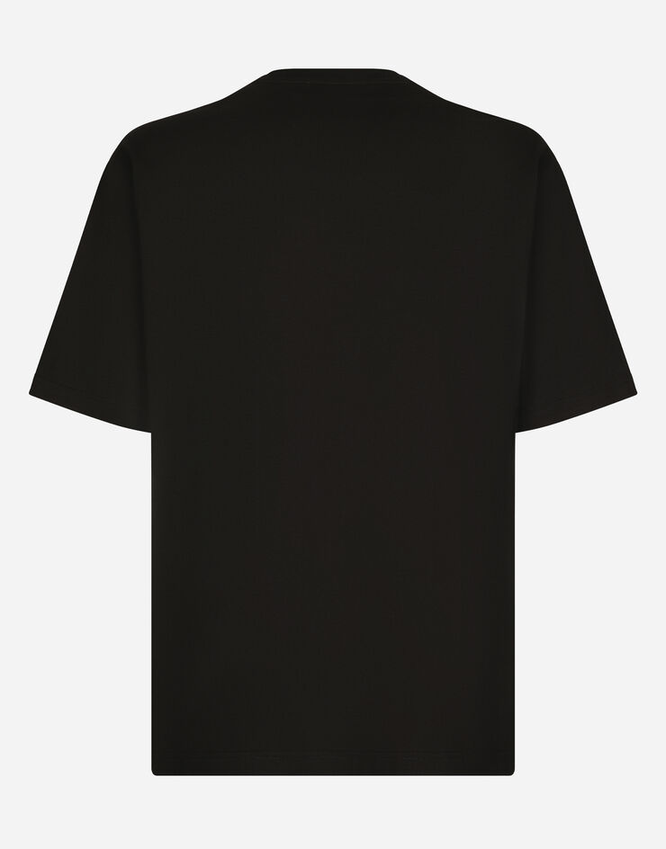 Dolce & Gabbana Baumwoll-T-Shirt mit DG-Strass-Patch Schwarz G8PN9ZG7K1P