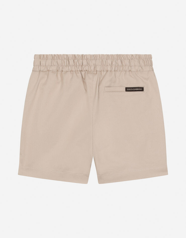 Dolce & Gabbana Bermuda en gabardine stretch avec étiquette à logo Beige L13Q08FUFJR