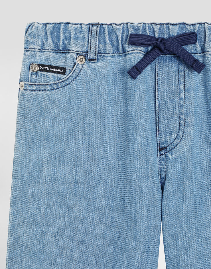 Dolce & Gabbana 5-pocket denim trousers with logo plaque Multicolor L42F84LDD30