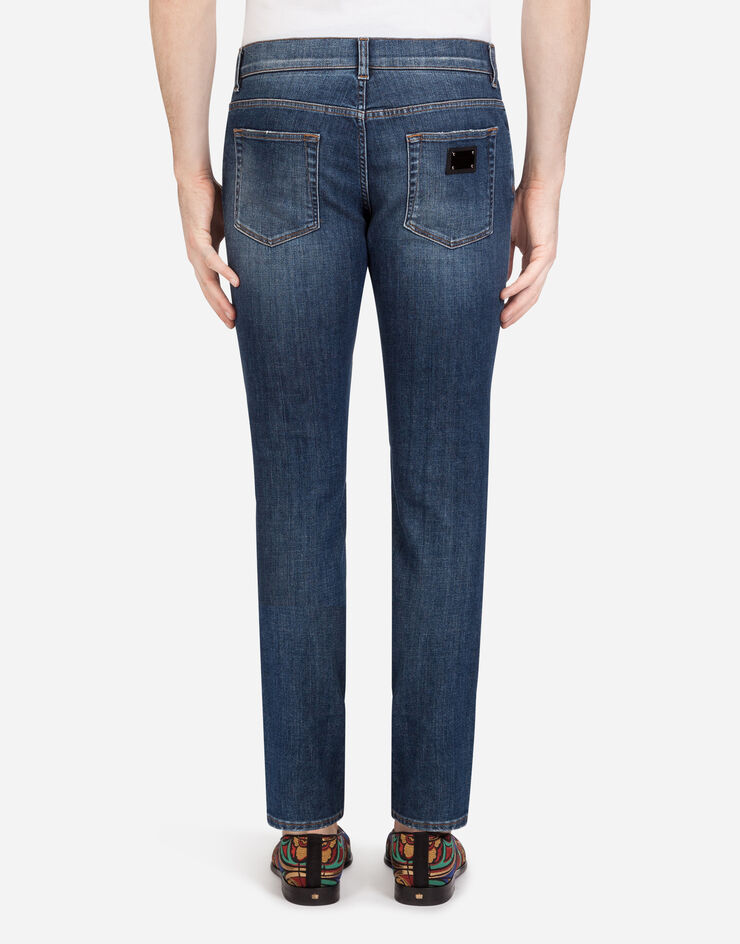 Dolce & Gabbana Stretch skinny jeans with small abrasions AZUL GY07LDG8BY6