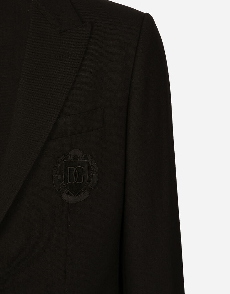 Dolce & Gabbana جاكيت صوف بقصة تاورمينا وصف أزرار مفرد ورقعة DG أسود G2NW0ZFU28E