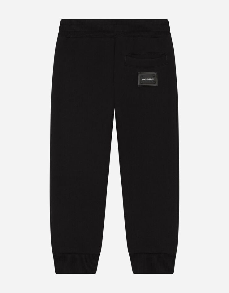 Dolce & Gabbana Jersey jogging pants with logo plate Black L4JPT0G7OLJ