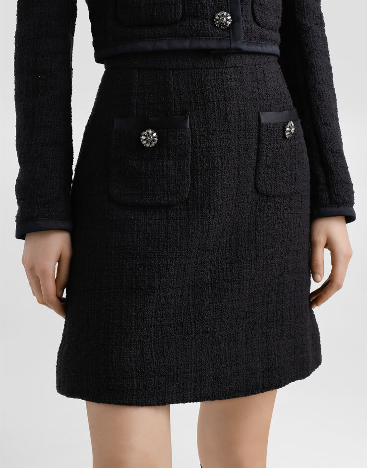 Dolce & Gabbana Falda corta acampanada de tweed raschel con botones joya Negro F4C0VZFMTAC