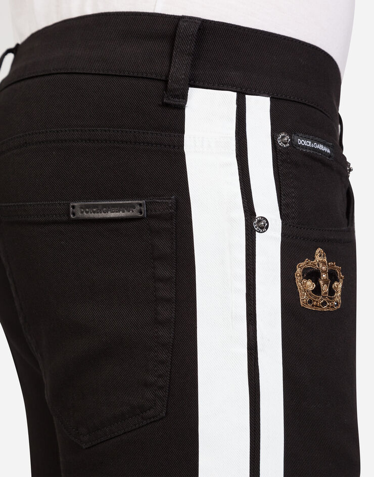 Dolce & Gabbana Stretch skinny jeans with strips and patch BLUE GYC4LZG8BW8