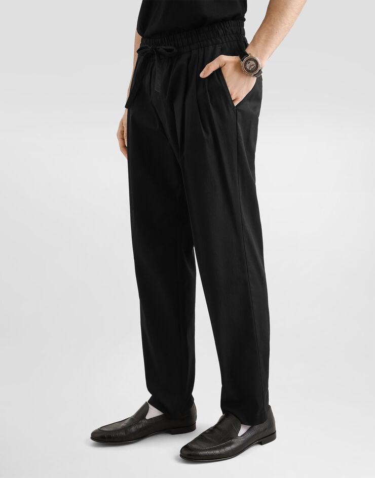 Dolce & Gabbana Pantalon de jogging en gabardine de coton Dolce & Gabbana Pantalon de jogging en gabardine de coton Black GP12QZFUFNV