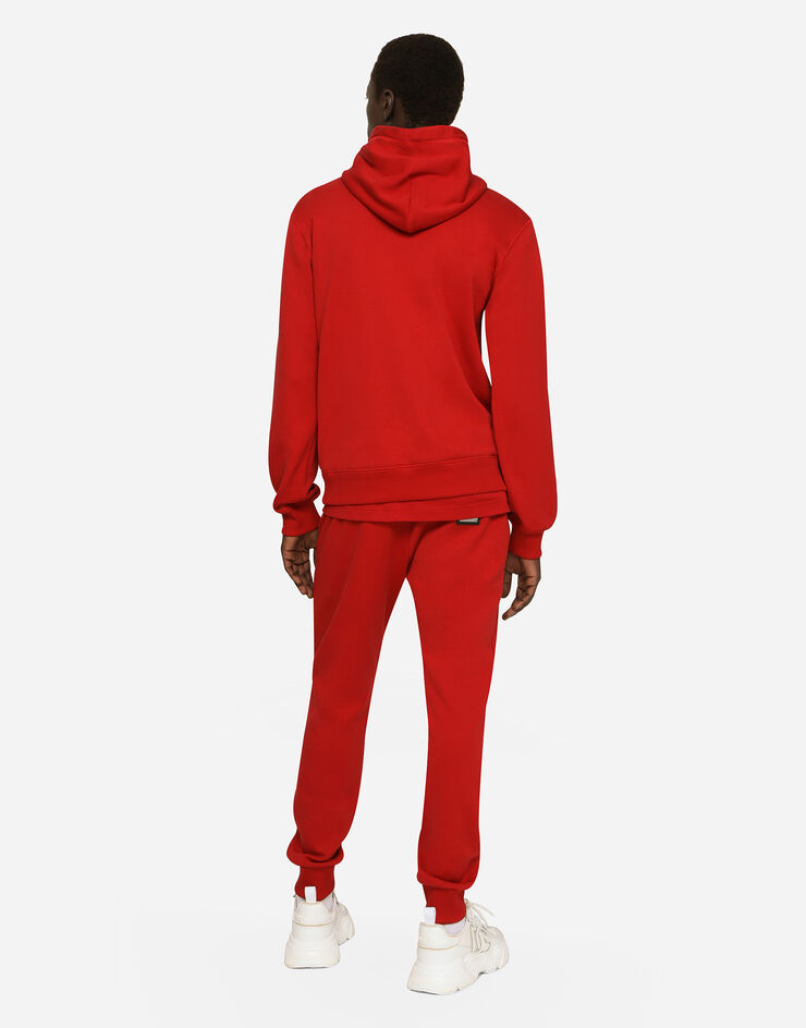 Dolce&Gabbana Pantalon de jogging en jersey avec plaquette à logo Rouge GVXQHTG7F2G