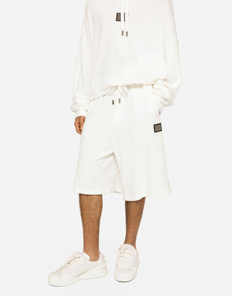 Dolce&Gabbana شورت رياضي من جيرسي تيري للركض ببطاقة شعار أبيض GVY4HTHU7OA