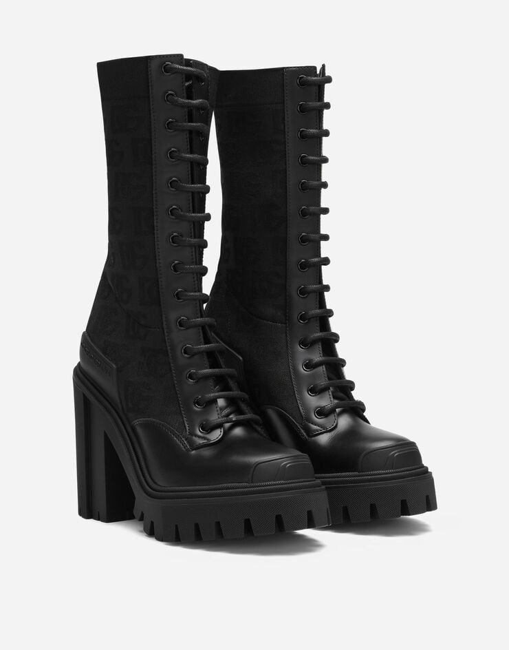Dolce & Gabbana حذاء بوت برقبة للكاحل من نسيج شبكي مرن بشعار DG بالكامل أسود CT0948AD971