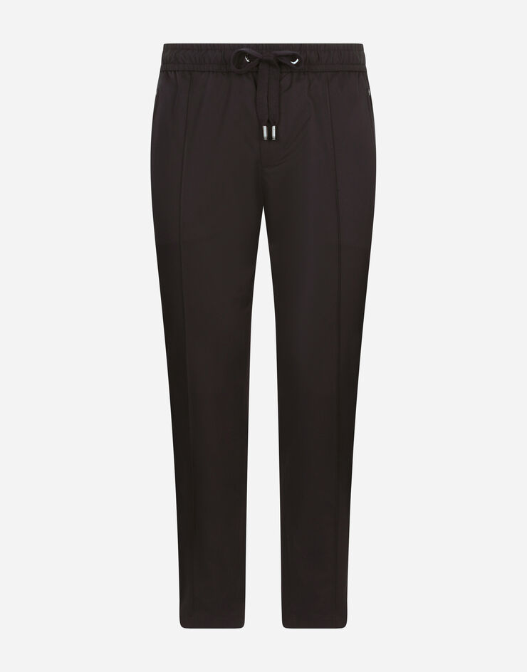 Dolce & Gabbana Stretch cotton jogging pants with plate Blue GYACETFUFJR