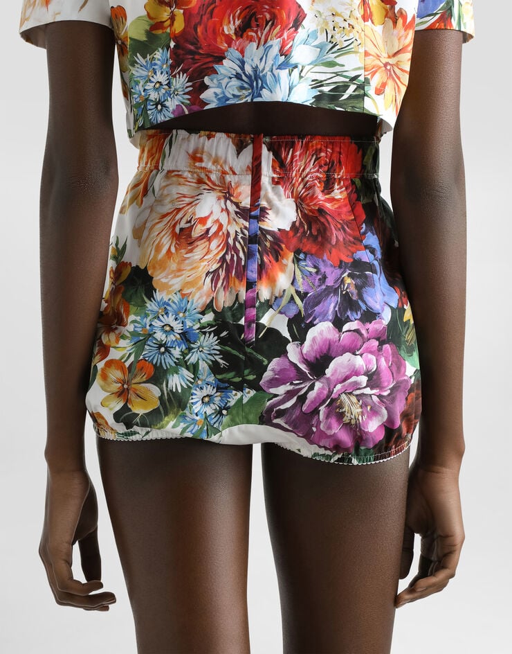 Dolce & Gabbana Shorts aus Popeline mit Bouquet-Print Drucken FTDDTTHS5TR