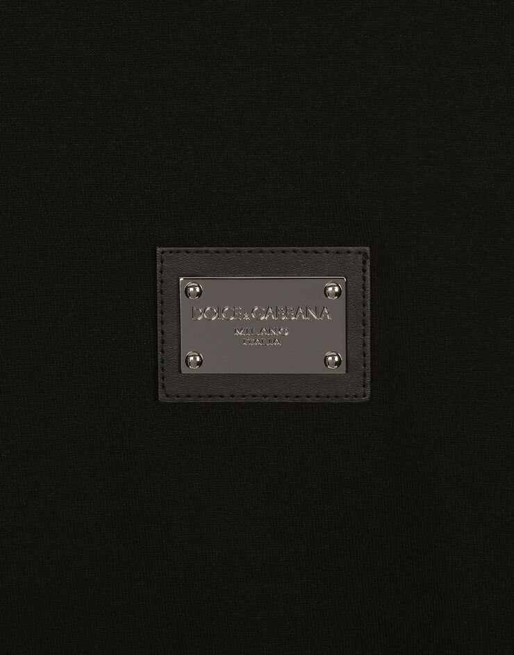 Dolce & Gabbana Baumwoll-T-Shirt mit Logoplakette Schwarz G8PT1TG7F2I