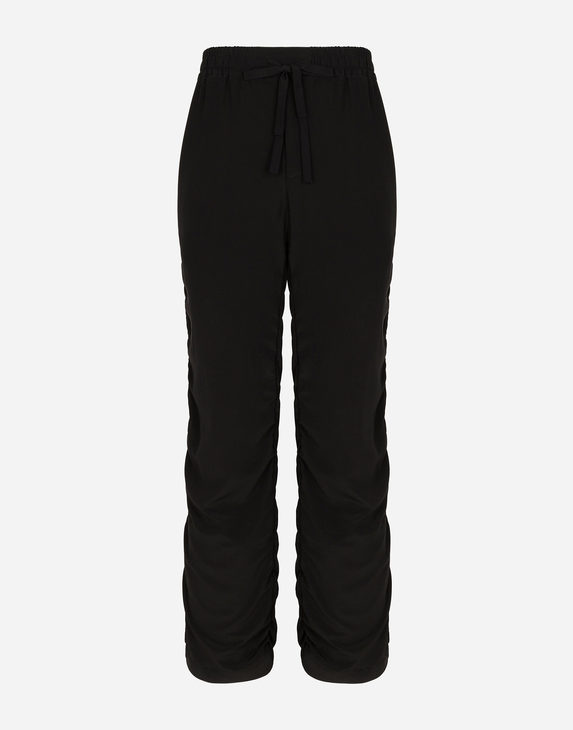 Dolce & Gabbana Silk jogging pants with gathered detailing Black GP03JTGH253