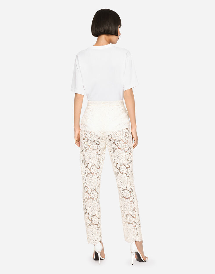 Dolce & Gabbana Pantalon en dentelle stretch à logo Blanc FTAM2TFLRE1