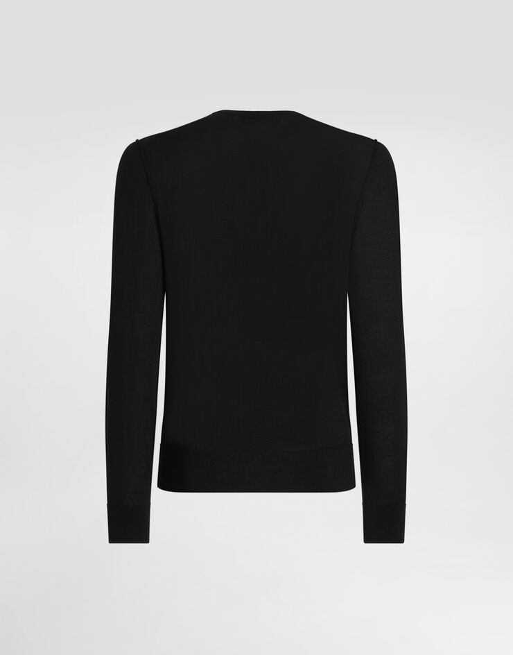 Dolce & Gabbana Maglia girocollo in cashmere con dettaglio gioiello Nero GXX02ZJBW05