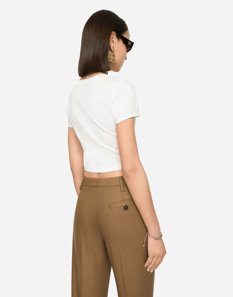 Dolce&Gabbana Flared flannel pants with logo tag Beige FTCZITGDBWW