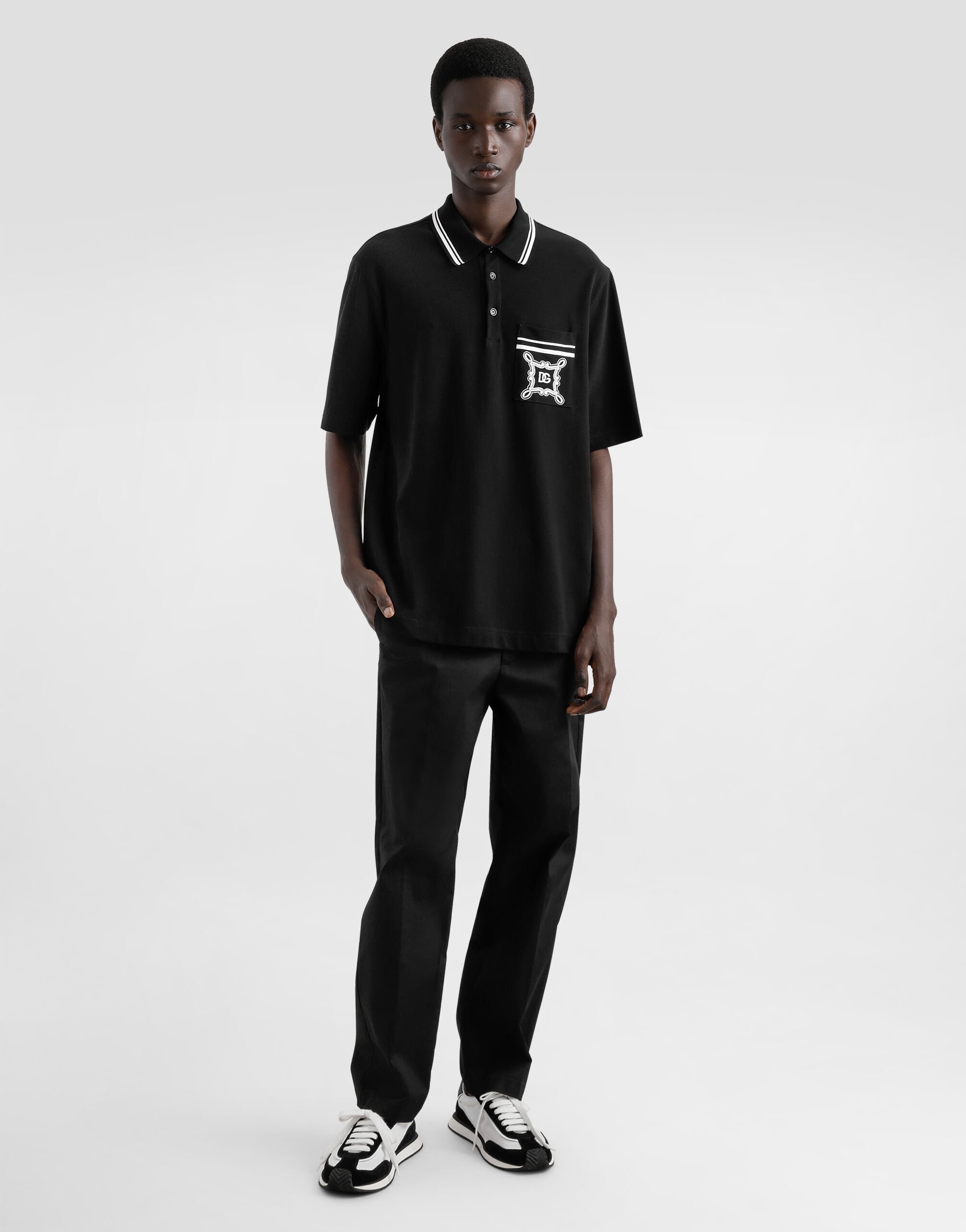 Cotton polo-shirt with bandanna-print details in Black for