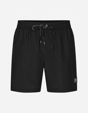Dolce & Gabbana Mid-length swim trunks with logo tag Black M4E45TONO06