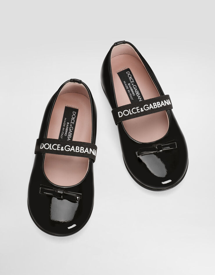 Dolce & Gabbana Ballerines en cuir verni avec nœud Noir D20093A4831