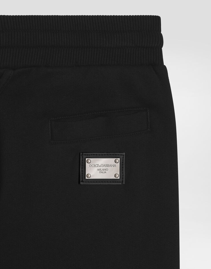 DolceGabbanaSpa Fleece trousers with DG logo plaque Black L4JPT0G7I2P