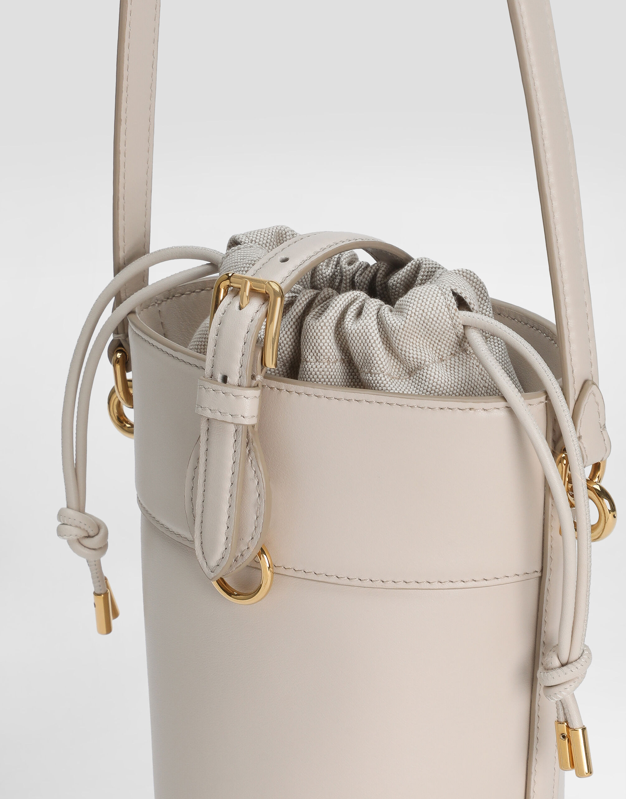 Capri bucket bag in calfskin and canvas in Beige for Women
