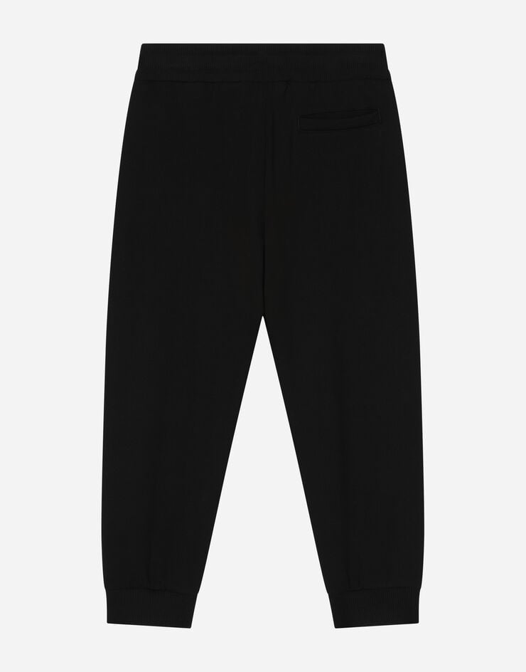 DolceGabbanaSpa Cotton jogging pants with logo print Black L4JPIGG7KU9