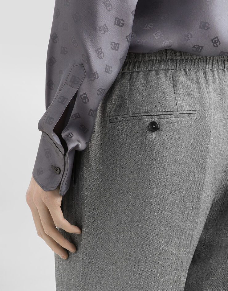 Dolce & Gabbana Pantalón de chándal en tela de lino lavada Gris GP12QZFU4MF