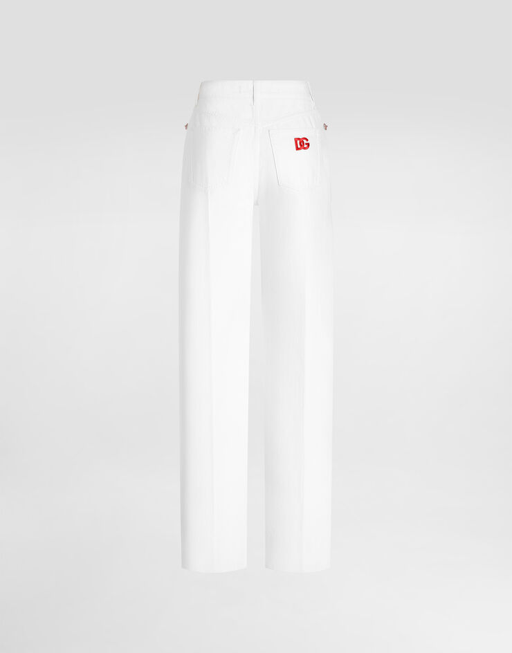 Dolce & Gabbana Pantalones de cinco bolsillos en denim con botones joya Dolce & Gabbana Pantalones de cinco bolsillos en denim con botones joya Multicolor FTC79ZG8PE9