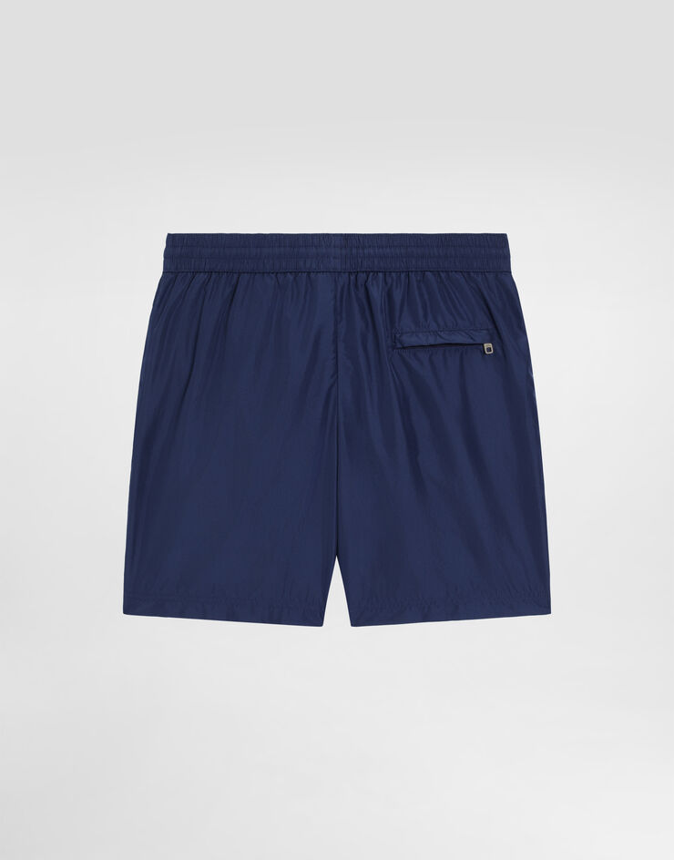 Dolce & Gabbana Mid-length swim trunks with branded plate Blue M4E45TFUSFW