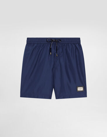 Dolce & Gabbana Mid-length swim trunks with branded plate Blue M4E45TFUSFW